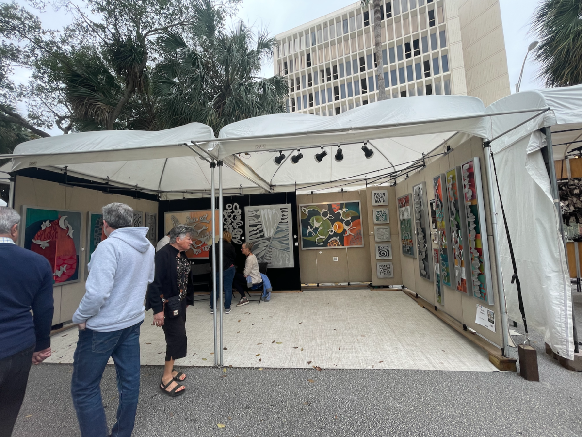 Attracting many visitors, Hamey's unique mixed media artworks are adorned with aluminum metal, leather and copper.